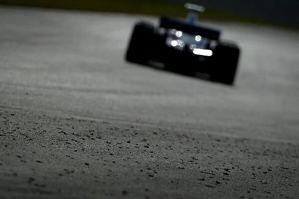 Formula One Testing: Marbles of rubber are left at the side of the racing line after months of testing