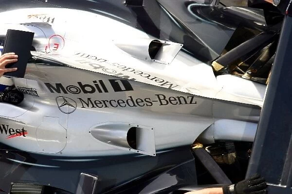 Formula One Testing: McLaren Mercedes MP4-18A rear body work and suspension detail