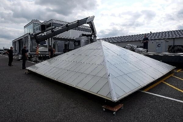 Formula One Testing: The McLaren Team pack away their huge Communications Centre after the British GP