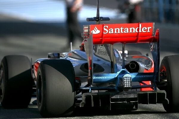 Formula One Testing: McLaren use blue aero paint around the rear of the car