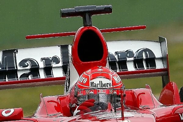 Formula One Testing: Michael Schumacher Ferrari F2004 with a mid-wing