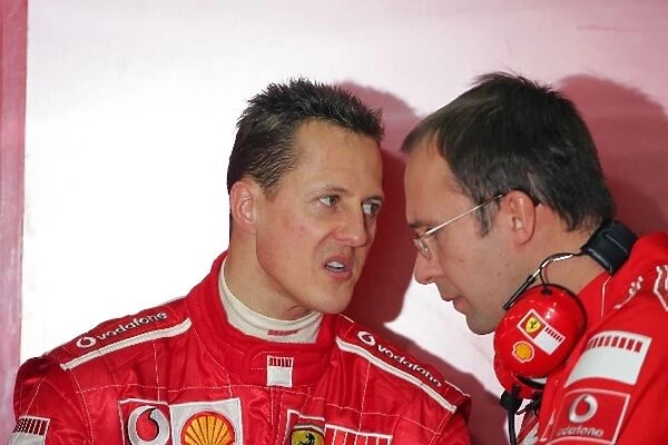 Formula One Testing: Michael Schumacher Ferrari talks to a Ferrari engineer