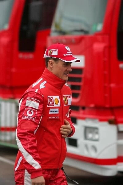 Formula One Testing: Michael Schumacher Ferrari walks through the paddock