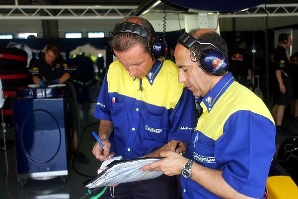 Formula One Testing: Michelin engineers in the Red Bull garage