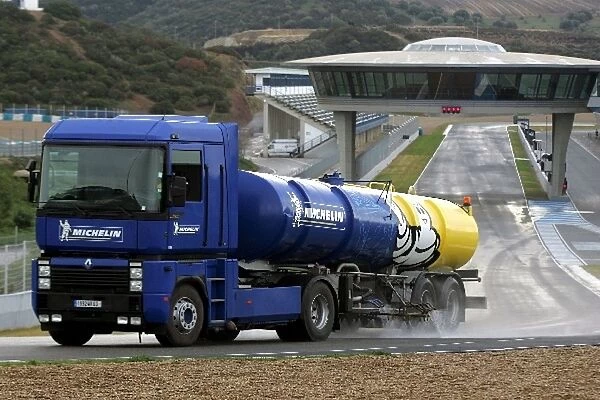 Formula One Testing: A Michelin tanker makes the track wet