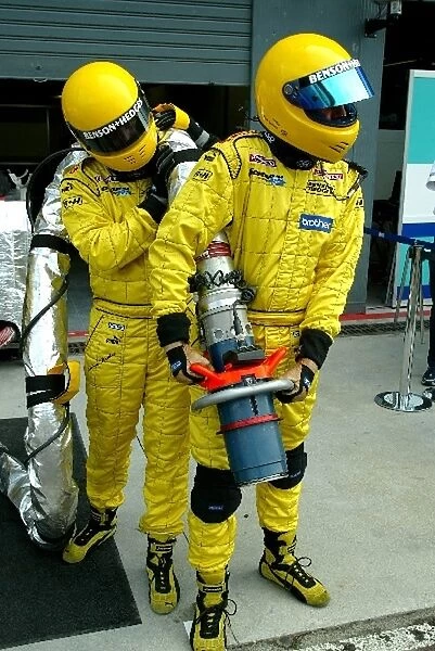 Formula One Testing: Mick Gomme and Andy Barber practice Refueling the Jordan