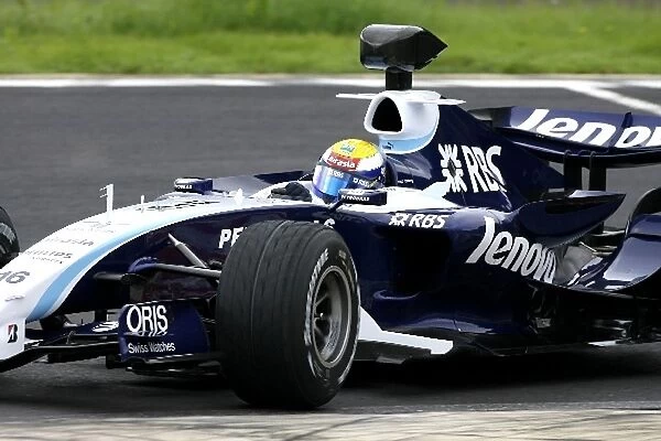 Formula One Testing: Nico Rosberg Williams FW28 runs a large monitoring device above the air intake