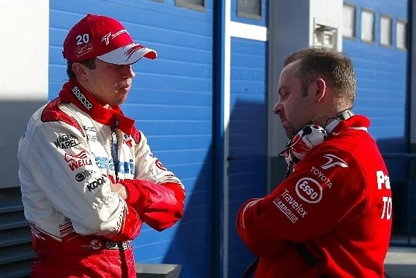 Formula One Testing: Olivier Panis Toyota talks with Mike Gascoyne
