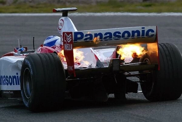 Formula One Testing: Olivier Panis Toyota TF103 spits flames from the exhausts