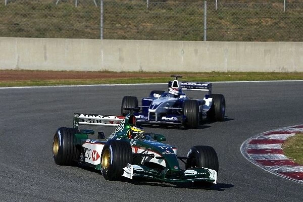Formula One Testing: Pedro de la Rosa Jaguar R3 leads Marc Gene BMW Williams FW23 during testing