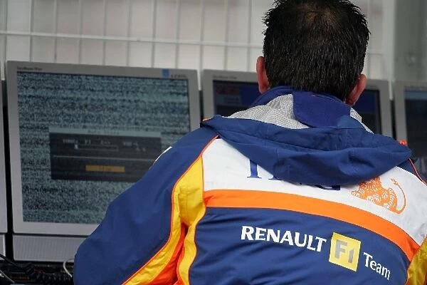 Formula One Testing: Renault engineer on the pitwall gantry