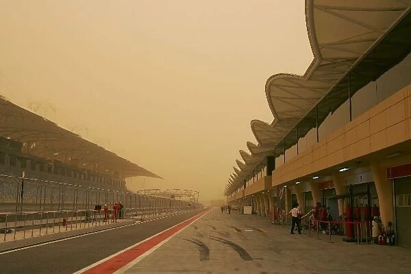 Formula One Testing: A sandstorm disrupts running early on day two. The pitlane
