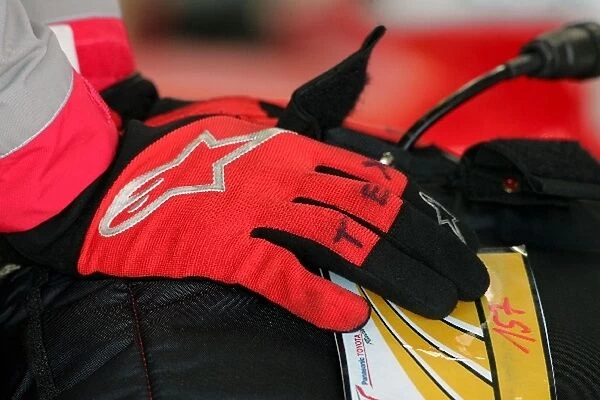 Formula One Testing: Toyota mechanic wearing alpinestars gloves