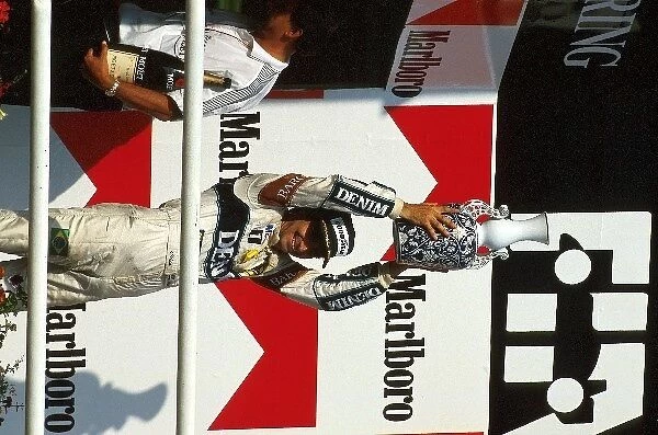 Formula One World Championship: 1st place and winner Nelson Piquet on the podium