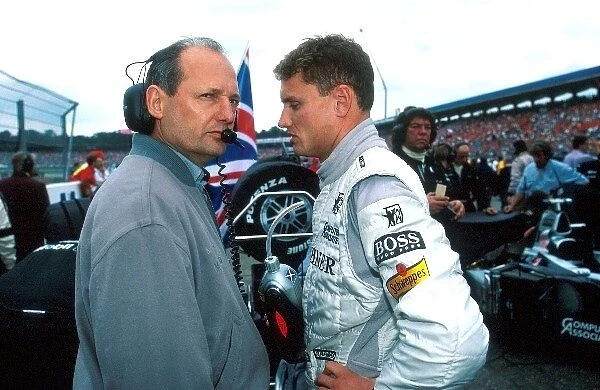 Formula One World Championship: 2nd place David Coulthard, McLaren MP4-13 chats with Team Boss Ron Dennis