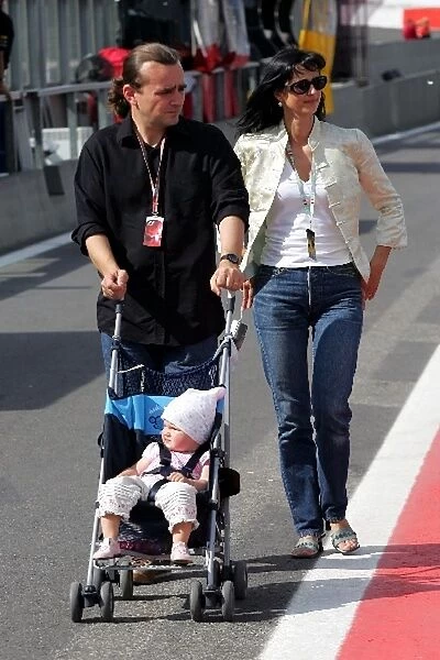 Formula One World Championship: Adam Cooper F1 Journalist with his wife and child