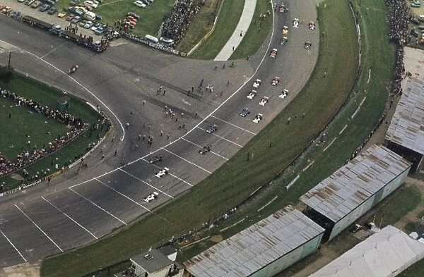 Formula One World Championship: An aerial view of the field heading around Woodcote and taking their grid positions for the start of the race