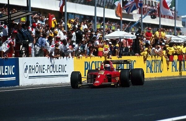 Formula One World Championship: Alain Prost Ferrari 641 crosses the line to score Ferraris 100th Grand Prix victory