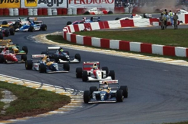 Formula One World Championship: Alain Prost leads at the start whilst Berger and Andretti crash at the back of the field