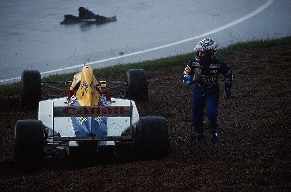 Formula One World Championship: Alain Prost Williams FW15C went off the track in wet conditions and retired