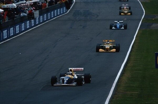 Formula One World Championship: Alain Prost Williams FW15C leads the field on his way to victory