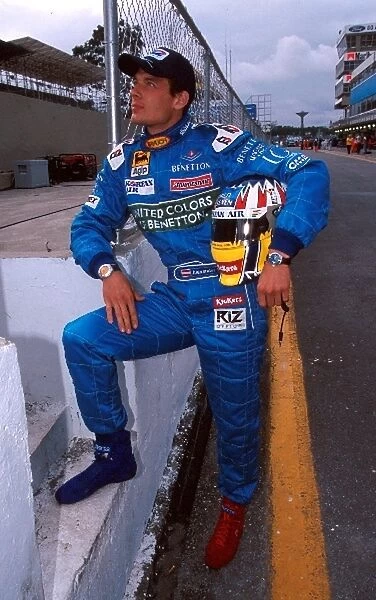 Formula One World Championship: Alex Wurz attempts to model Benetton race wear for their mail order catalogue