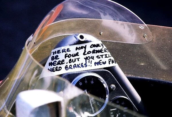 Formula One World Championship: An amusing message is left above the steering wheel of a McLaren M23: There may only be four corners here