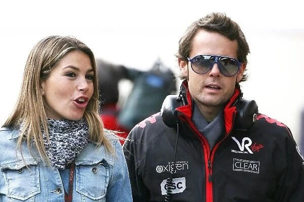 Formula One World Championship: Andy Soucek Virgin test driver with Nira Juanco La Sexta TV presenter