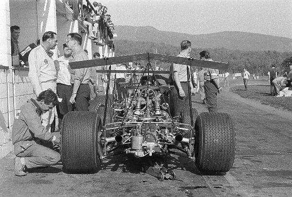 Formula One World Championship: An anhedral wing arrangement on the Brabham BT 26. Note mechanic working on rear wheel, Ron Dennis now CEO of Mclaren