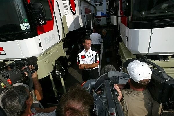 Formula One World Championship: A BAR mechanic keeps the media out as the trucks are impounded