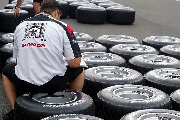 Formula One World Championship: A BAR mechanic with Michelin tyres