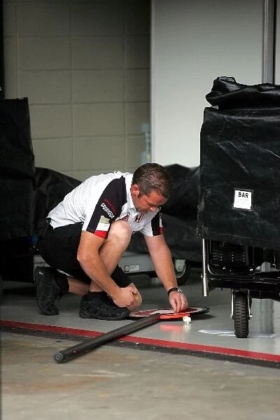 Formula One World Championship: A BAR mechanic prepares the pit lollipop
