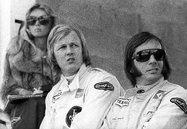 Formula One World Championship: Barbro Peterson with race retiree Ronnie Peterson and second placed Lotus team mate Emerson Fittipaldi
