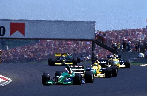 Formula One World Championship: Bertrand Gachot Jordan Ford 191, leads Roberto Moreno Benetton Ford B191 and his team mate Nelson Piquet