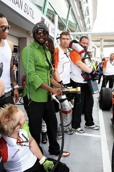 Formula One World Championship: The Black Eyed Peas practice pit stops with the Force India F1 Team