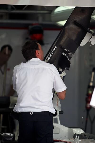 Formula One World Championship: The BMW Sauber C29 of Kamui Kobayashi BMW Sauber after it suffered a front wing failure