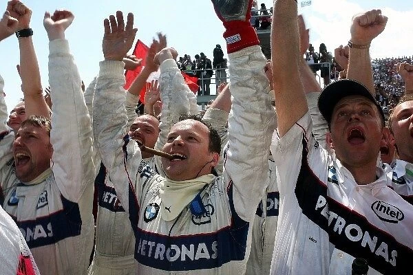 Formula One World Championship: BMW Sauber celebrates the first GP win and a 1-2 finish for the team at the podium