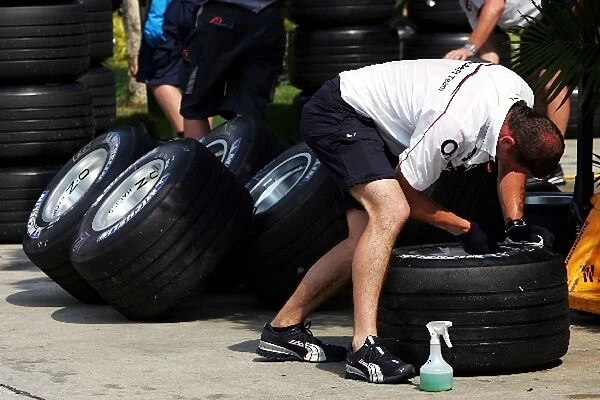 Formula One World Championship: BMW Sauber clean their tyres