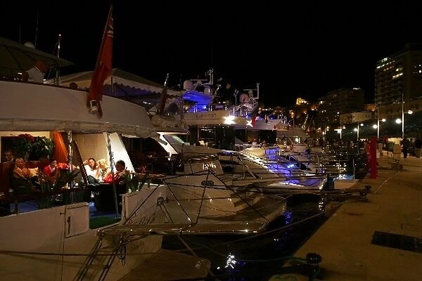 Formula One World Championship: Boats in Monaco harbour at night