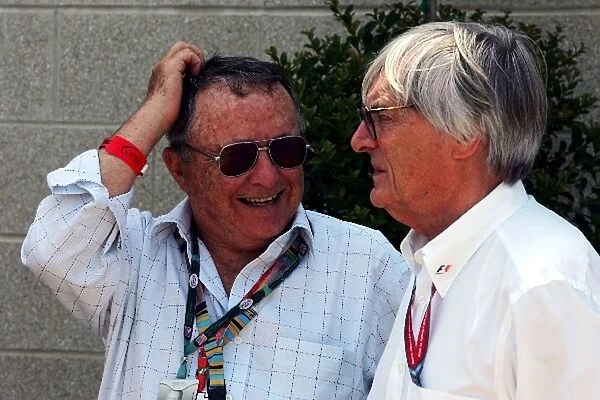 Formula One World Championship: Bob Labelle formerly of Goodyear tyres and F1 Consultant talks with Bernie Ecclestone F1 Supremo