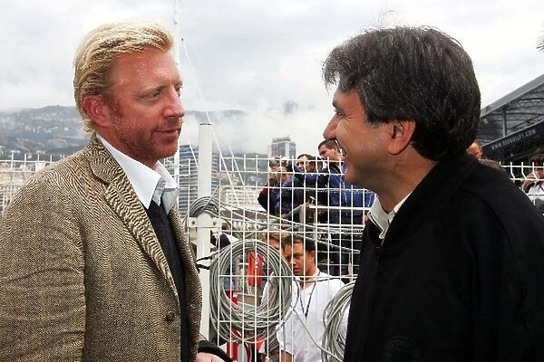 Formula One World Championship: Boris Becker with Pasquale Lattuneddu of the FOM