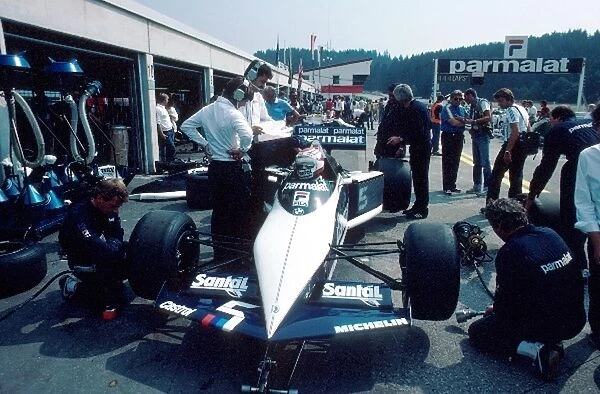 Formula One World Championship: The Brabham of Nelson Piquet recieves some attention from his mechanics in the pits