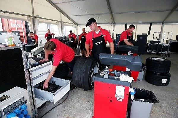 Formula One World Championship: Bridgestone mechanics in their work area