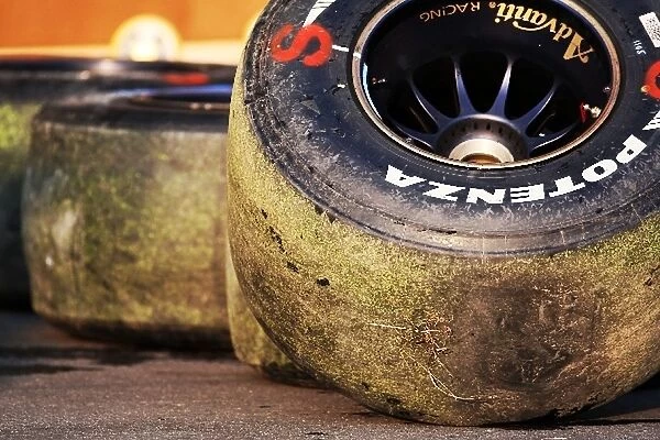 Formula One World Championship: Bridgestone tyres covered in grass