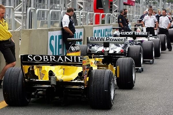 Formula One World Championship: The cars line up in the pitlane for scrutineering