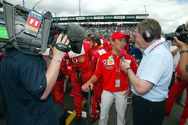 Formula One World Championship: Champion Jockey Frankie Dettori is interviewed by Martin Brundle from ITV