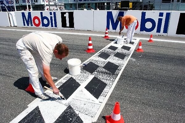 Formula One World Championship: The chequered finish line is painted onto the circuit