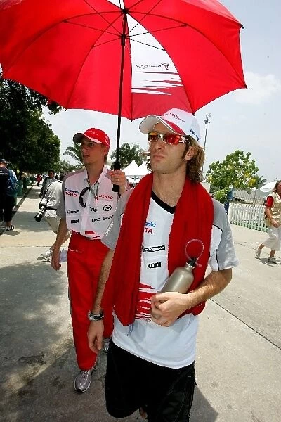 Formula One World Championship: Chris Hughes and Jarno Trulli Toyota during the drivers parade
