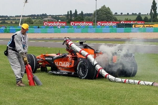 Formula One World Championship: Christian Albers Spyker F8-VII retires with the fuel hose still attached to the car