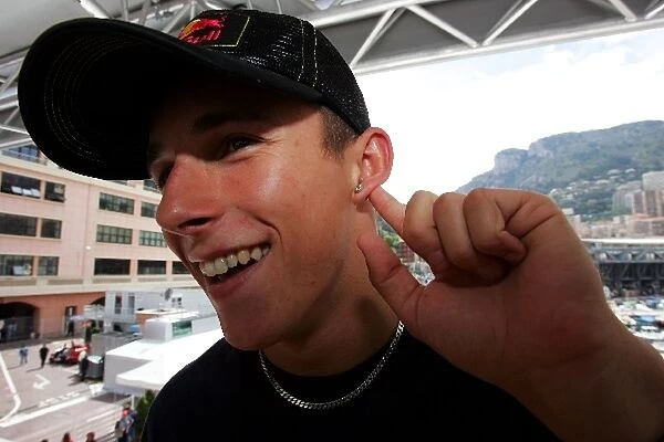 Formula One World Championship: Christian Klien shows off his earing in the Red Bull Racing Energy Station